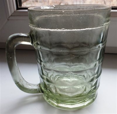 Mug for beer. Side view.