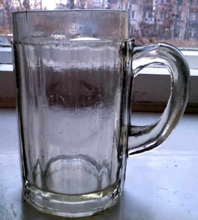 Mug for beer. Side view.